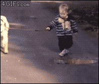 Walking-dog-waits-puddle.gif